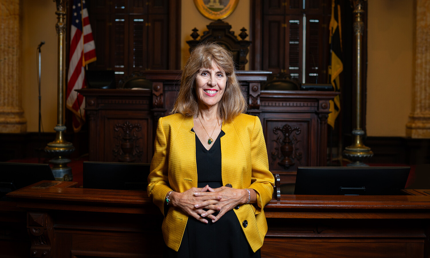 Isabel Mercedes Cumming stands for a photo In City Hall in Baltimore, Maryland.