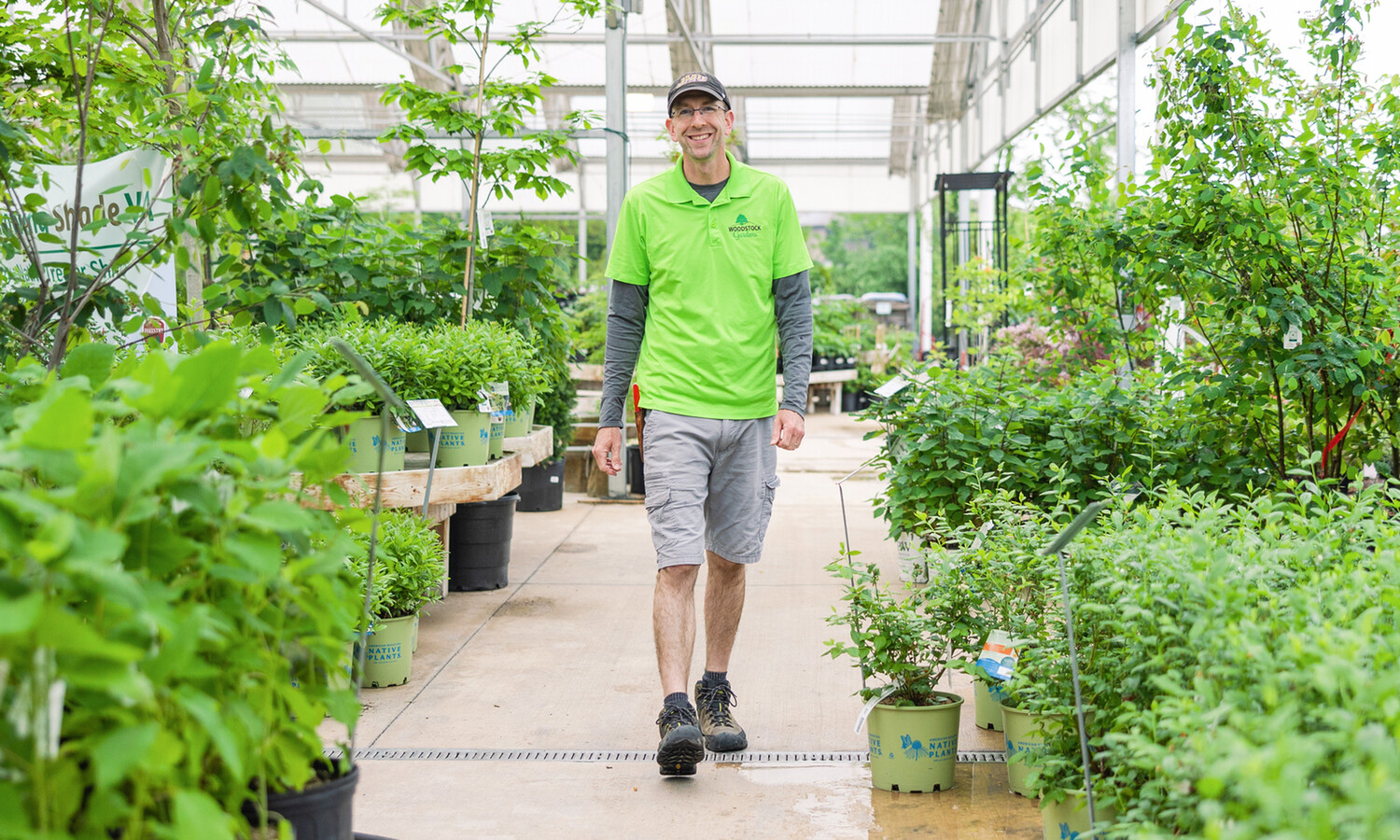 John Fogle (’04), manager at Woodstock Gardens, walks by native plants for sale as part of the statewide native plant program Throwing Shade, which incentivizes native plant sales with grant-funded discounts. The pilot program ended in June but may continue around Virginia this fall after organizers study data from the pilot program.